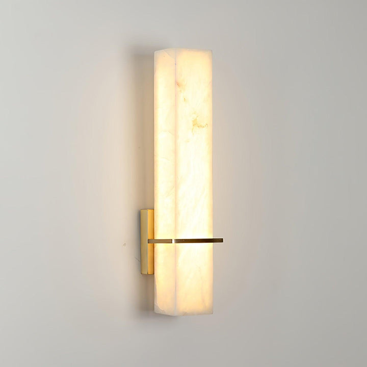 Minimalist hardwired cuboid indoor wall lamp, ideal for bedroom ambient lighting.