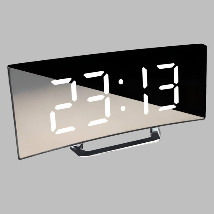 Clear view of the bright LED display on a curved digital alarm clock, showing time with a modern minimalist design.