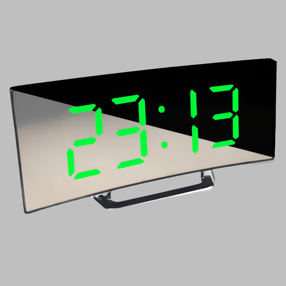 Sleek curved LED alarm clock on a bedside table, offering a digital time display & snooze feature for bedrooms.