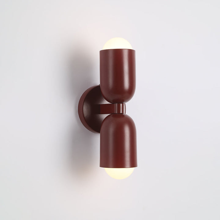 Bedroom Cylinder LED Wall Lamp, sleek design adds modern touch to decor.