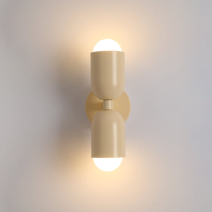 Contemporary metal Cylinder LED Wall Lamp, ideal for modern home accents.