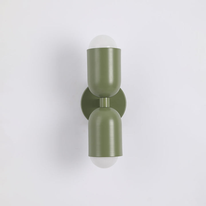 Modern cylindrical LED wall lamp, for stylish bedroom and living room decor.