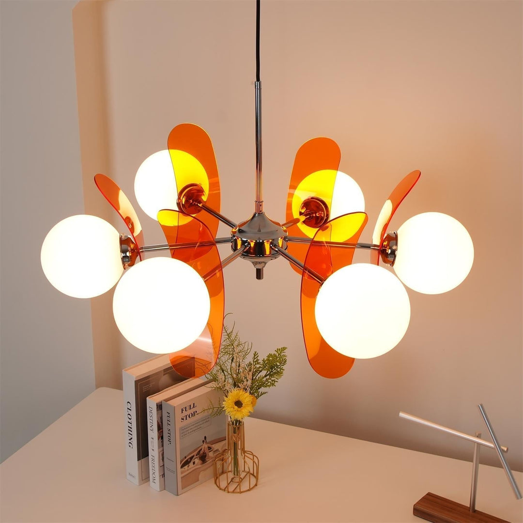 Hawii pendant light, a designer orange chandelier providing soft ambient illumination.