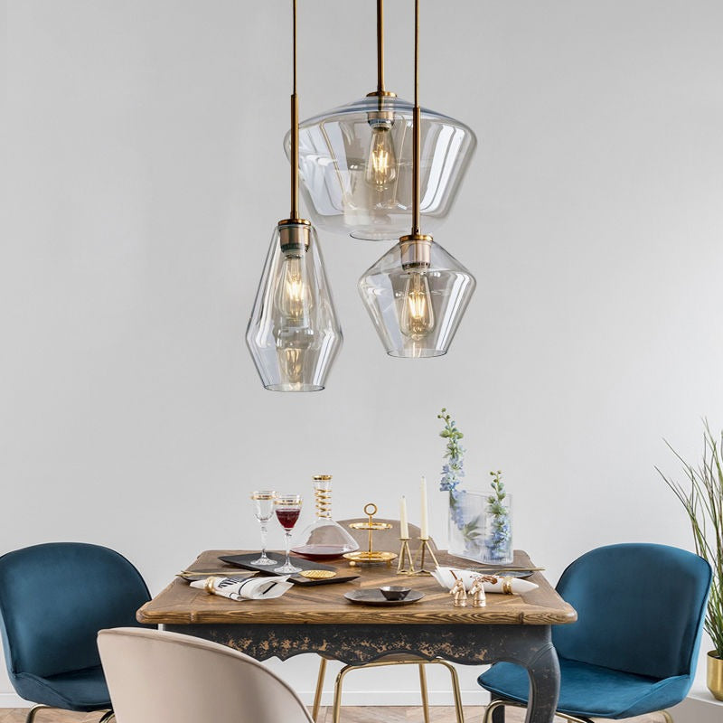 Chic modern glass pendant, diamond shaped, for striking interior lighting statements.