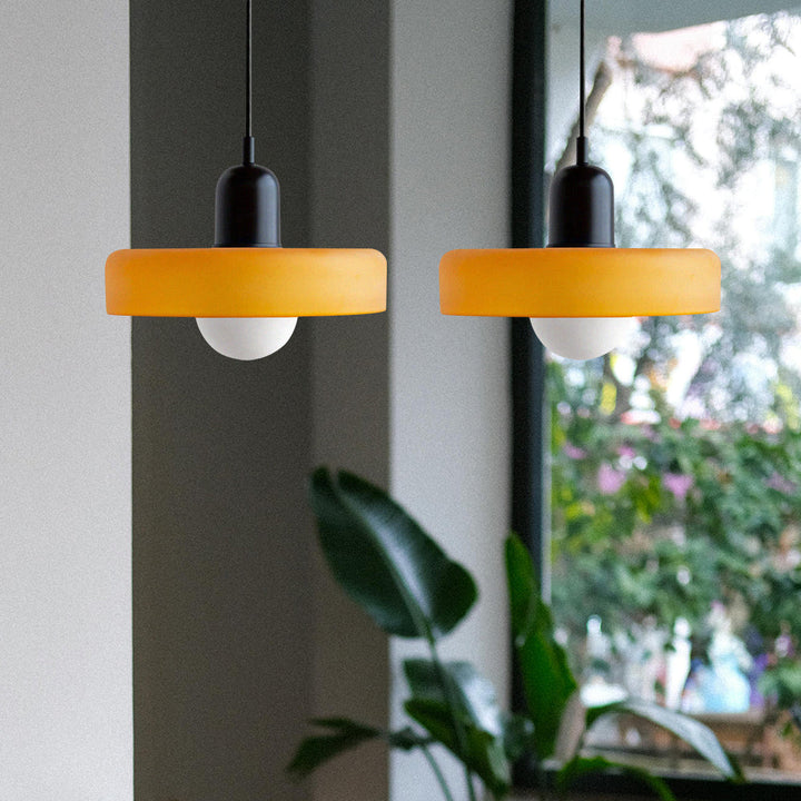 Contemporary double glass pendant light, perfect for inviting dining spaces.