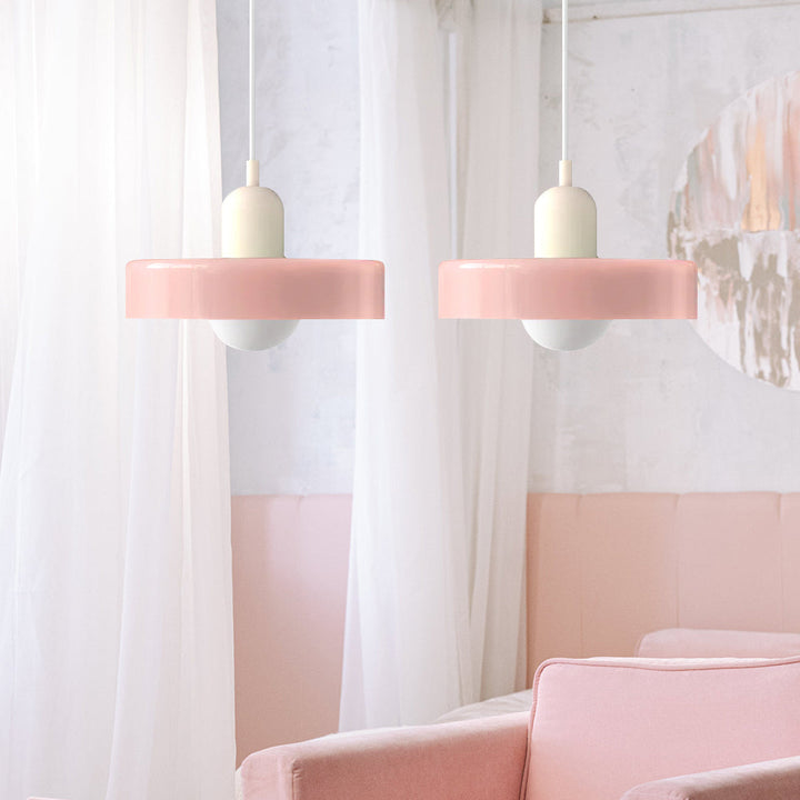Elegant double glass pendant, casting a warm glow in dining rooms.