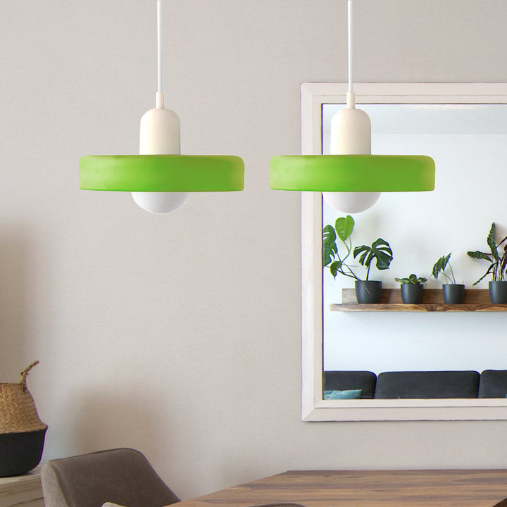 Modern double glass pendant light, illuminating living room with elegance.