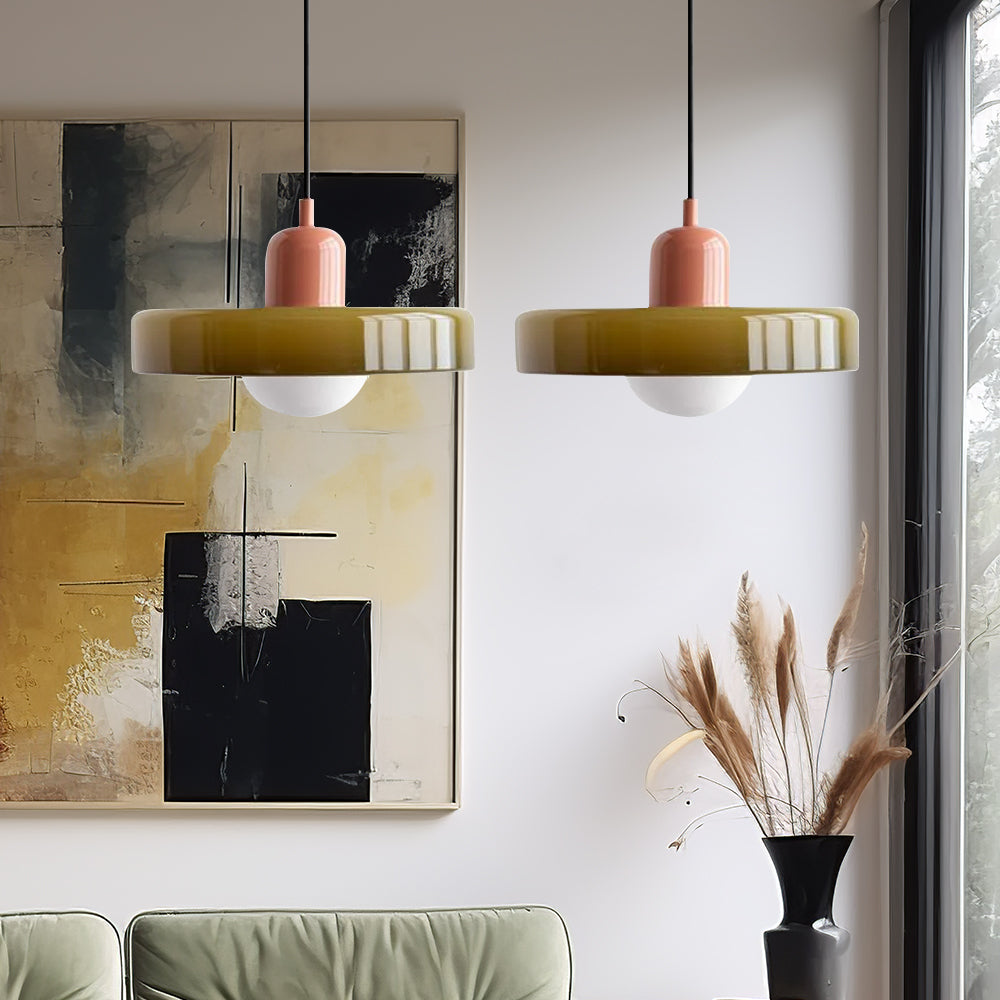 Decorative glass pendant light with two shades, for modern dining spaces.