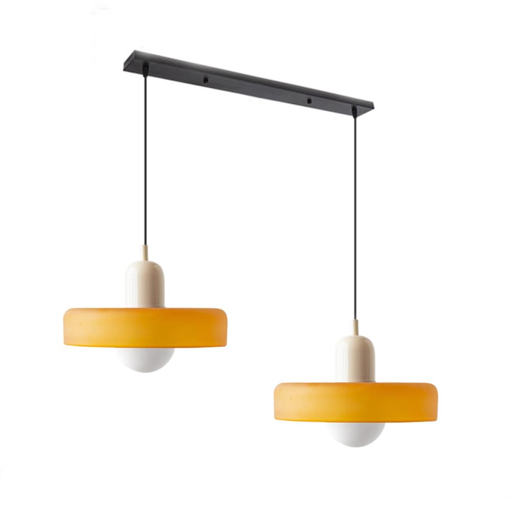 Modern double glass ceiling fixture, creating a cozy living room setting.