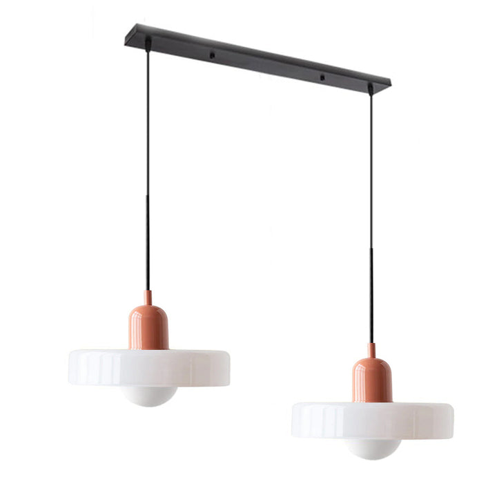 Stylish double glass pendant light, a focal point in modern dining areas.