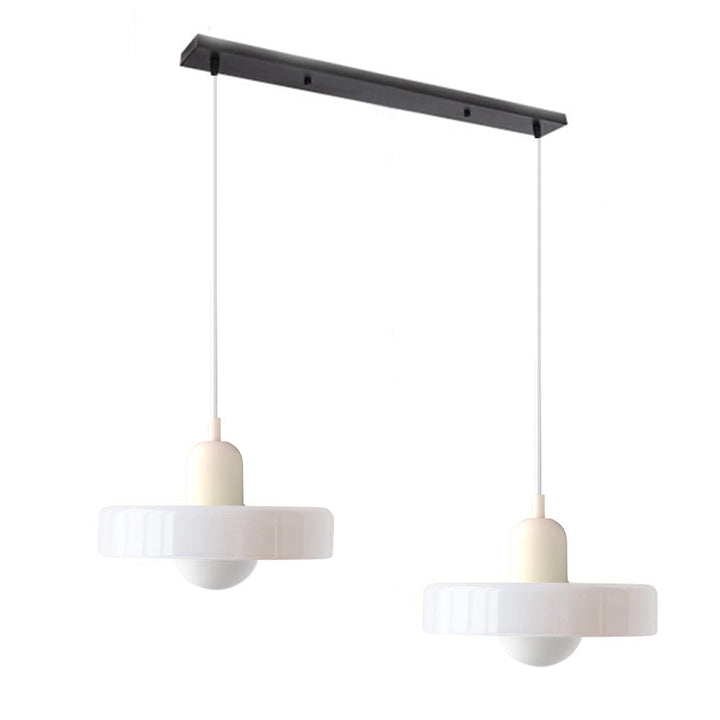 Modern double glass hanging light, offering sophisticated dining ambiance.