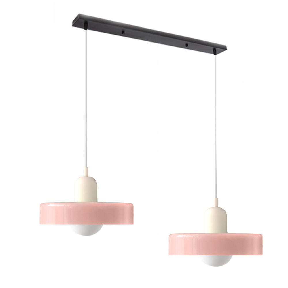 Contemporary double glass pendant, ideal for bright dining room settings.