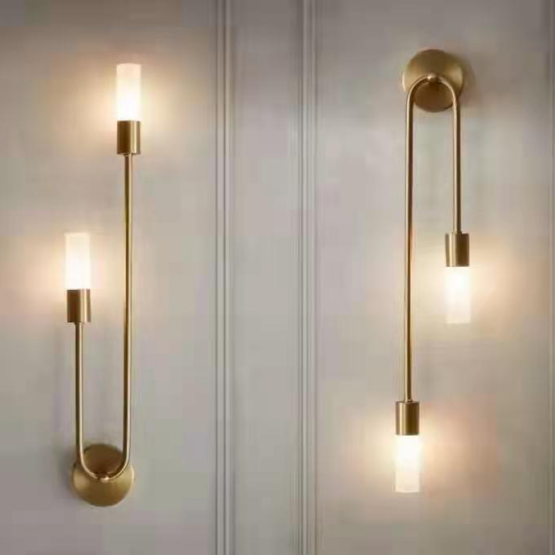 Elegant Eldmo modern wall lamp, gold finish, providing sophisticated LED lighting for any room.