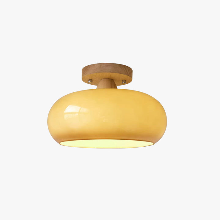 Modern flush mount ceiling light with wood and glass, perfect for living room decor.