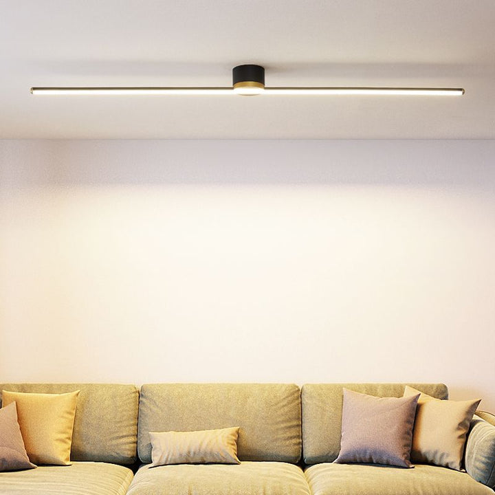 Long linear LED flush mount ceiling light, offering brilliant ambient light for home.