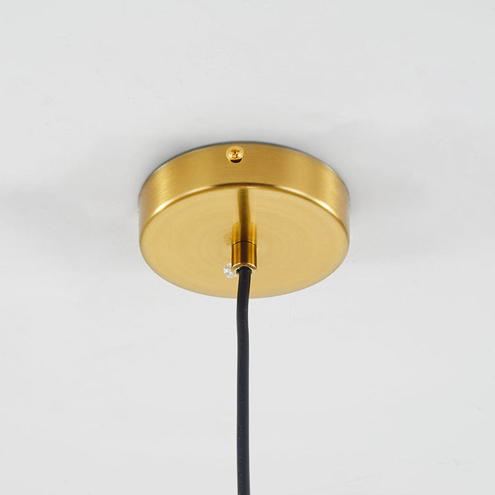 Bright modern glass globe pendant light, illuminating bedrooms and dining rooms.