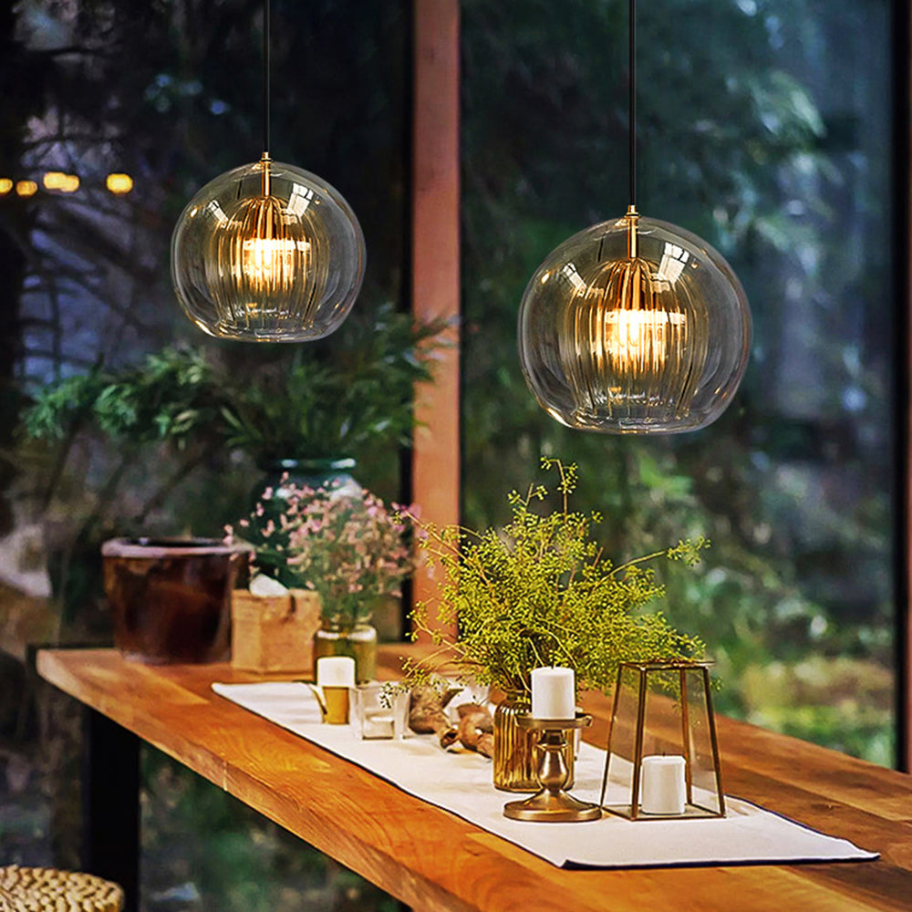Clear glass globe pendant ceiling light, modern lighting for living rooms.