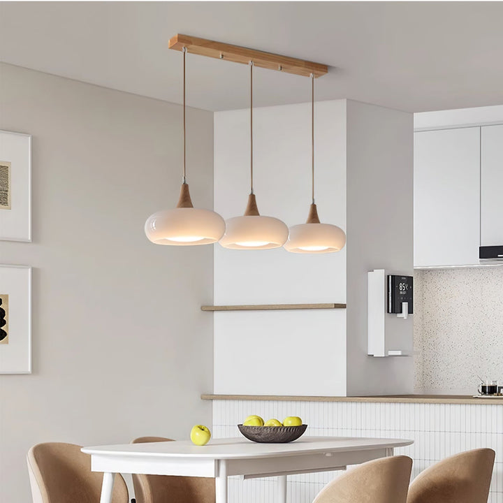 Beautiful glass & wood pendant light, ideal for modern home decor in any room.