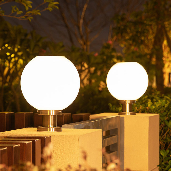 Modern globe outdoor post light. Stainless steel, weatherproof LED garden & pathway lighting for exterior decor.