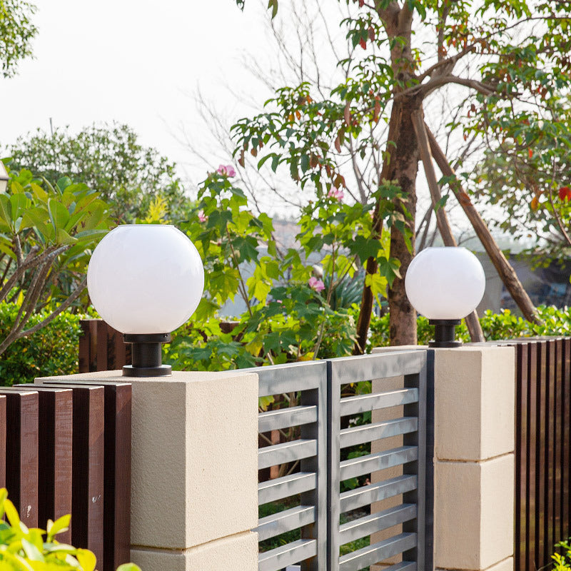 Stylish globe fence post lights, ideal for modern outdoor garden and pathway illumination. Weatherproof exterior LED lighting.