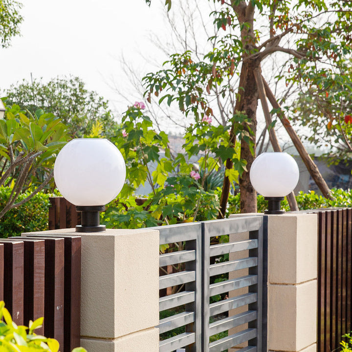 Stylish globe fence post lights, ideal for modern outdoor garden and pathway illumination. Weatherproof exterior LED lighting.