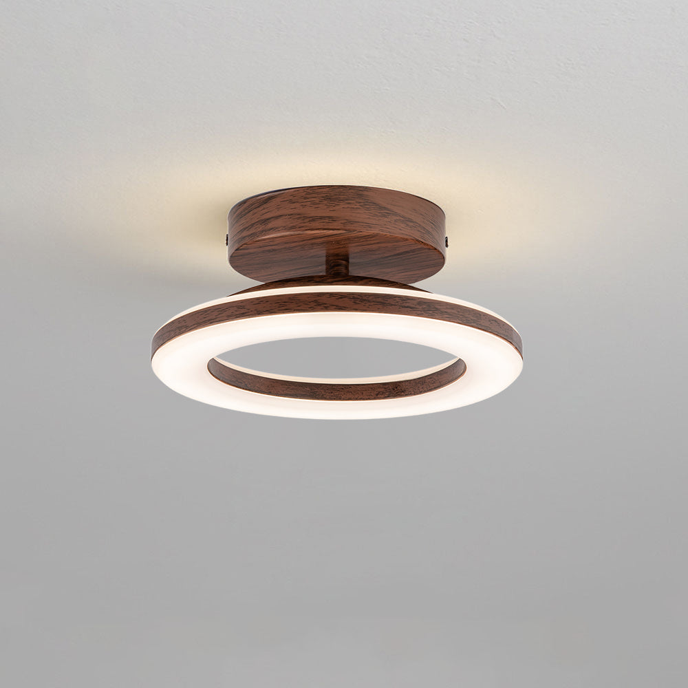 White LED ceiling light, modern glow disc for an energy-efficient and clean aesthetic.