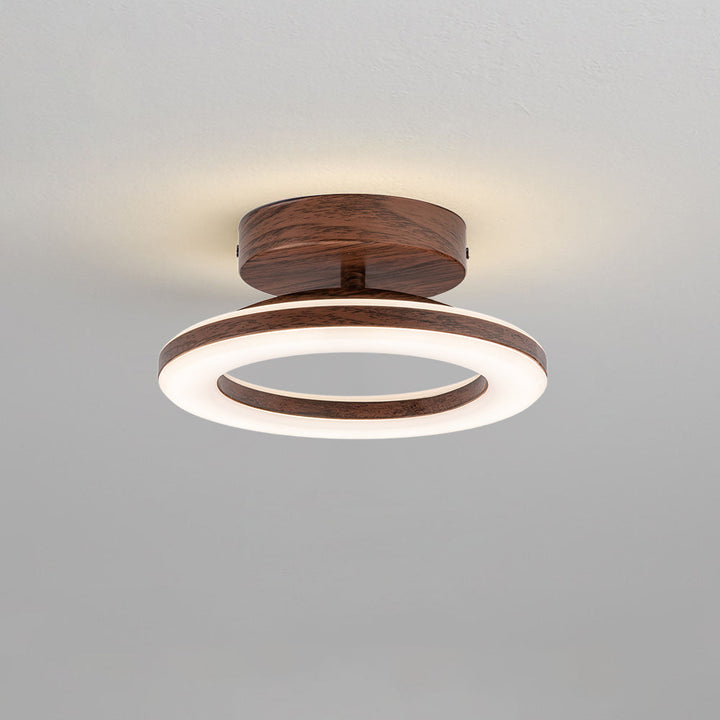 White LED ceiling light, modern glow disc for an energy-efficient and clean aesthetic.