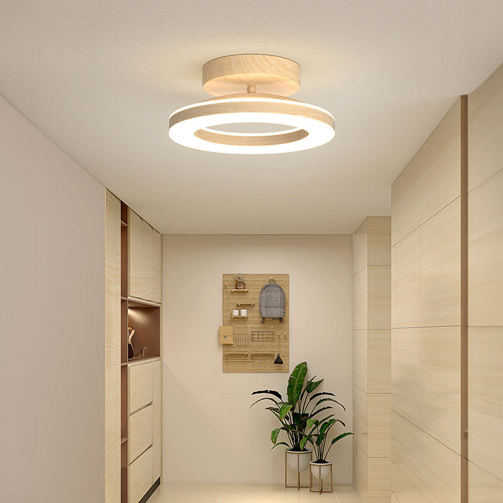 Sleek LED disc ceiling lamp, energy-efficient for hallway or bedroom ambient lighting.