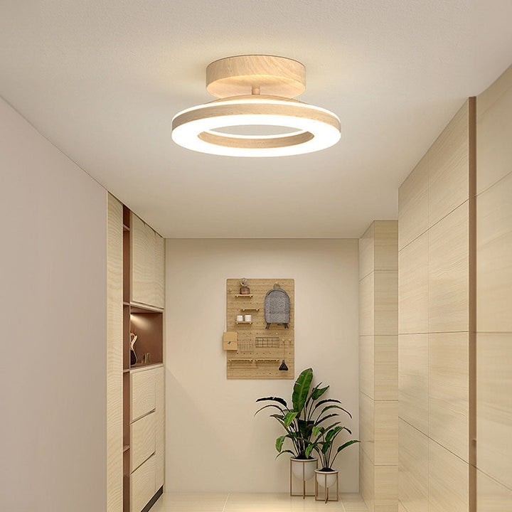 Sleek LED disc ceiling lamp, energy-efficient for hallway or bedroom ambient lighting.