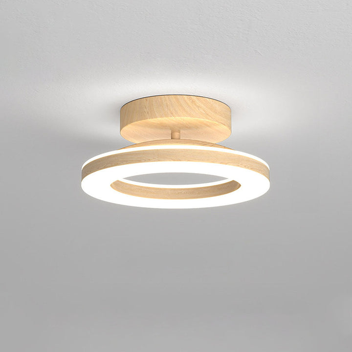 Contemporary LED ceiling fixture, neutral glow for elegant living room or dining area.