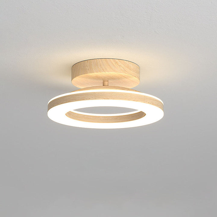 Round LED ceiling light, modern minimalist style for bright and efficient home decor.