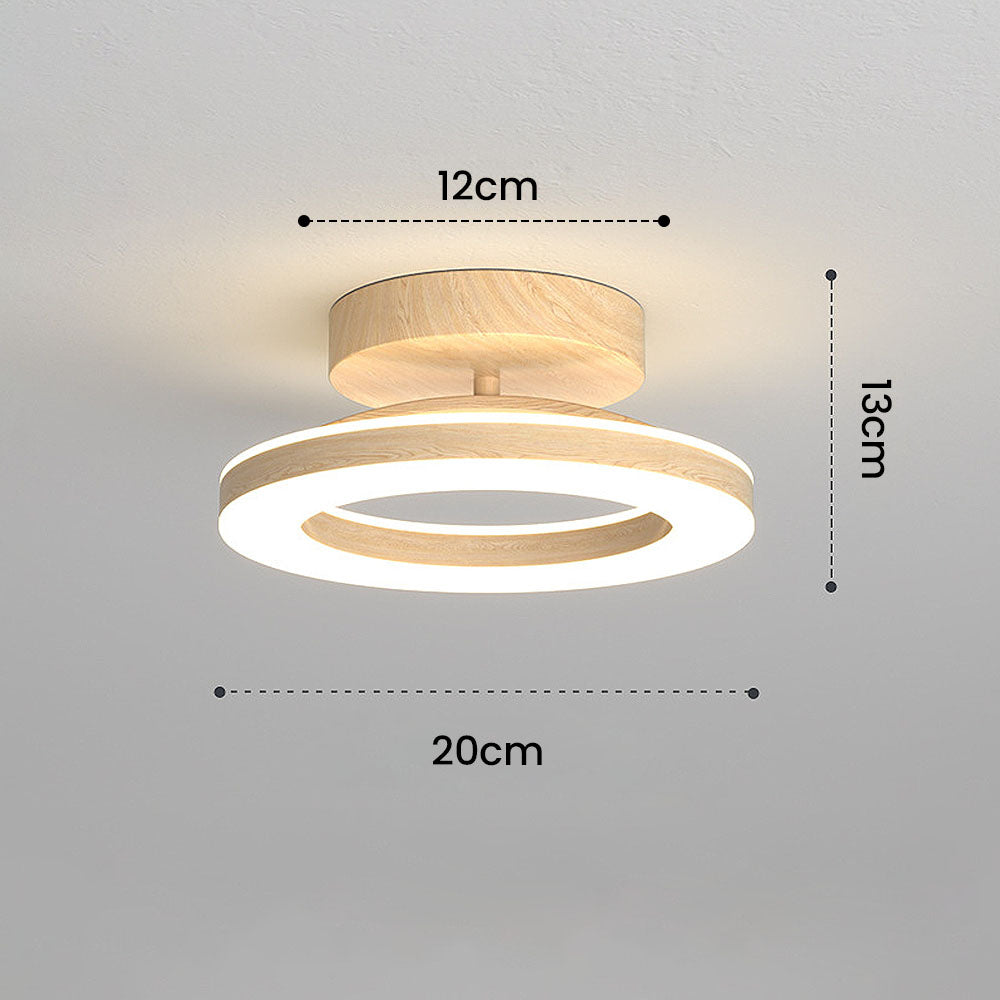 Energy-efficient LED ceiling light, disc design perfect for modern kitchen or office.