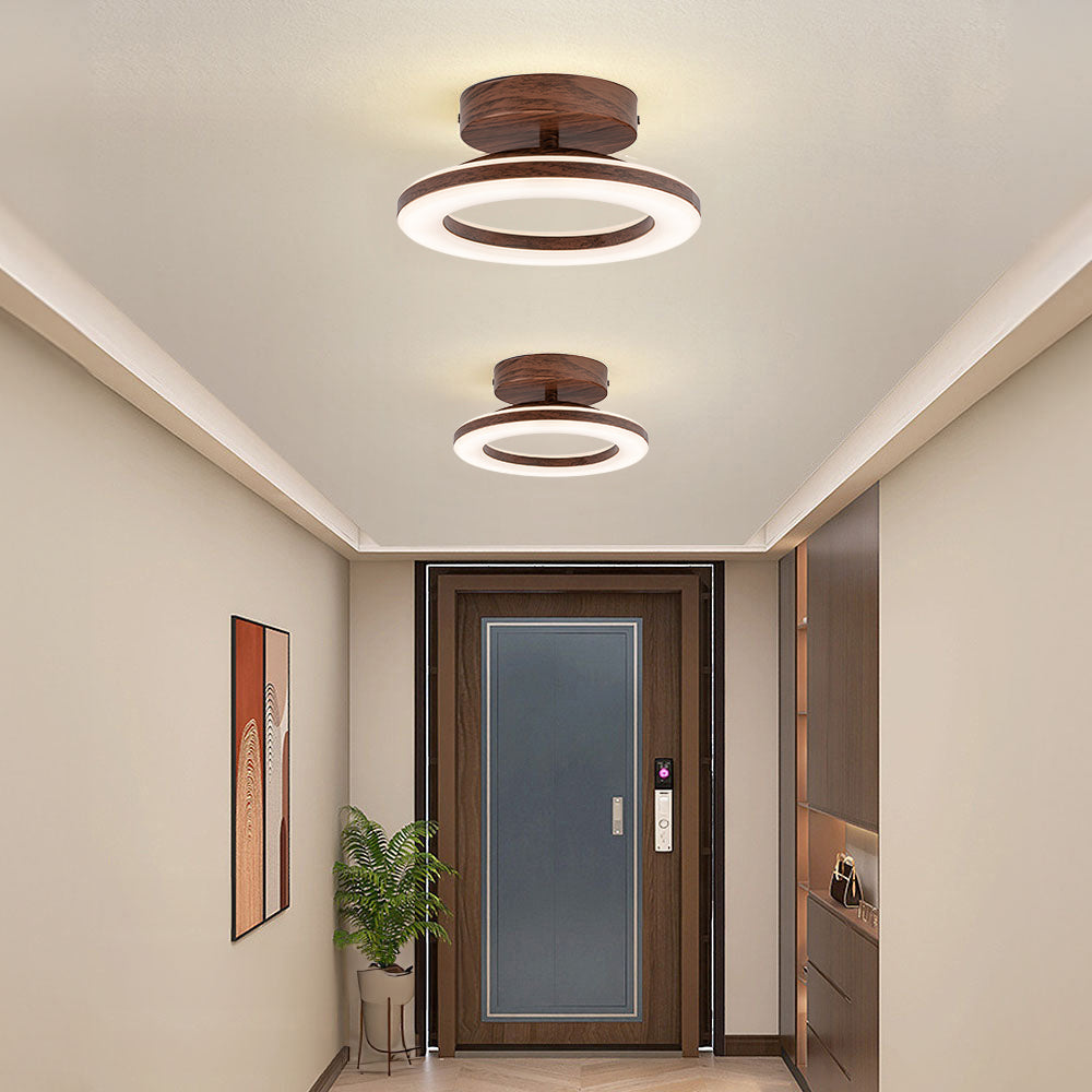 Modern LED ceiling fixture with a sleek disc profile, ideal for low-profile illumination.