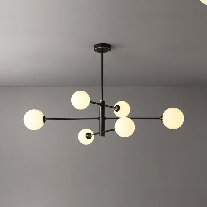 Gold multi-light globe pendant, elegant modern chandelier for spacious living rooms.