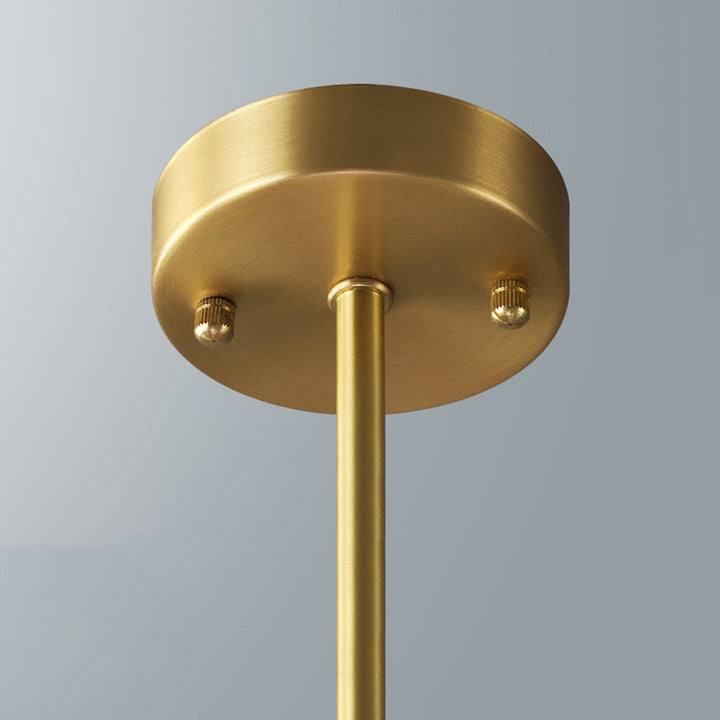 Black globe multi-light ceiling fixture, contemporary design for stylish dining rooms.
