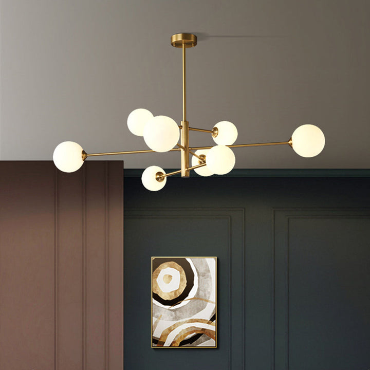 Contemporary gold globe chandelier, multi-light pendant for sophisticated modern living.