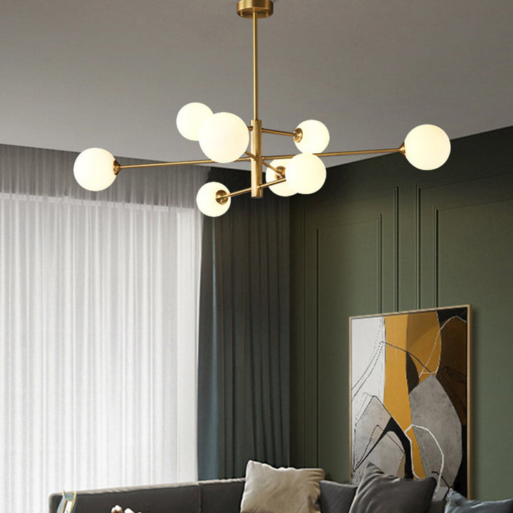 Modern globe chandelier, multi-light design with gold finish for contemporary homes.