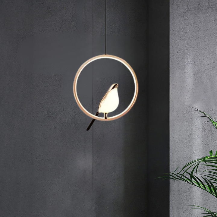 Golden bird-themed modern pendant light. An artistic ceiling lamp for unique and elegant home interiors.