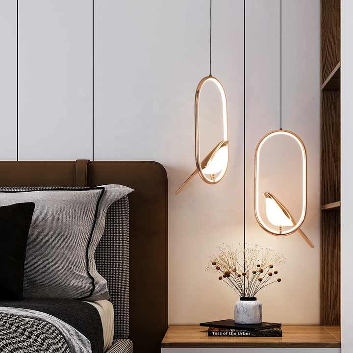 Golden bird decorative pendant light, a unique modern ceiling lamp, adding artistic flair to any room.