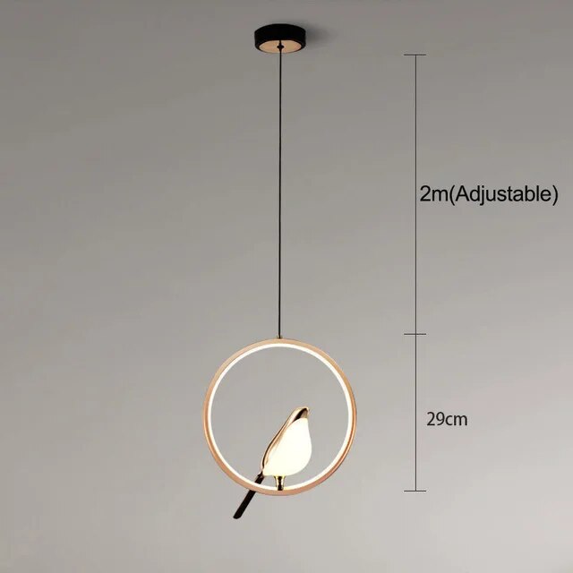 Artistic golden bird design on a modern pendant light. Ideal ceiling lamp for luxurious home decor.