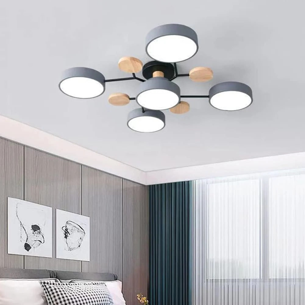 Modern LED semi-flush fixture with sleek halo design for living rooms.