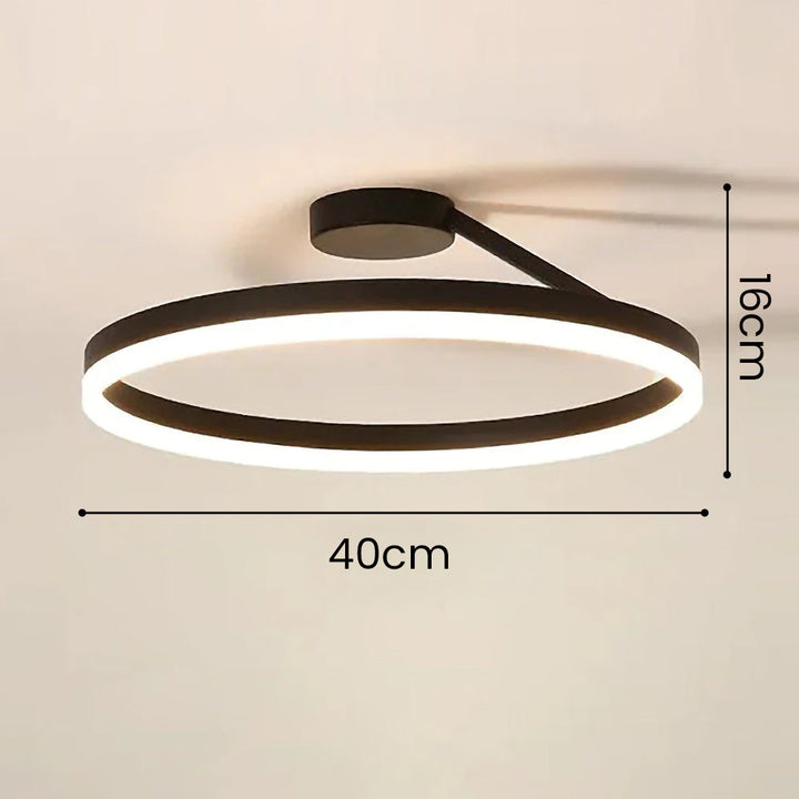 Minimalist LED ceiling light, offering clean lines and brilliant illumination.