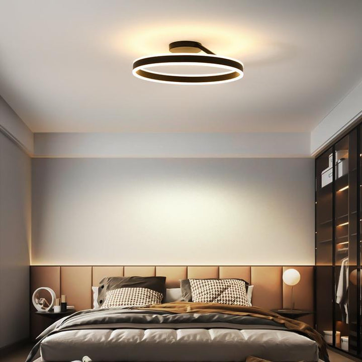 Minimalist LED ceiling fixture in white, perfect for modern home decor.