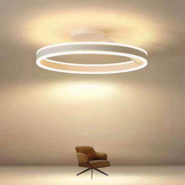 Minimalist LED ceiling light, featuring durable metal and acrylic construction.