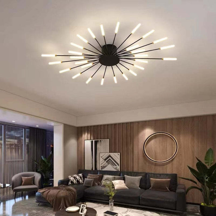 Gold LED chandelier with a captivating fireworks burst design.