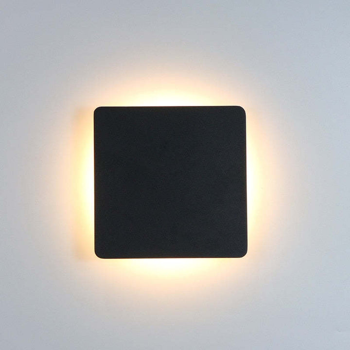Elegant LED outdoor wall light, enhancing garden & patio home decor.