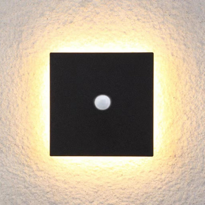 Smart LED outdoor wall light with motion sensor for enhanced security & convenience.