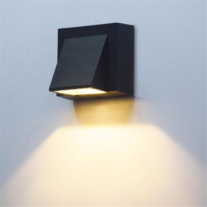 Architectural modern LED outdoor wall sconce, enhancing home decor with stylish exterior lighting.