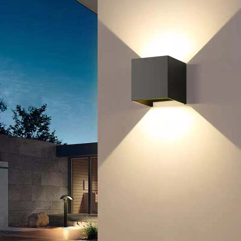 Energy-efficient LED wall lamp, black finish, perfect for modern outdoor and indoor home decor.