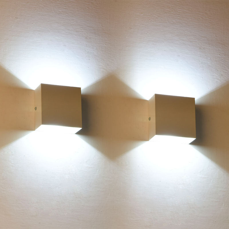 Versatile LED wall light, modern, energy-efficient, perfect for outdoor facades or indoor accent lighting.
